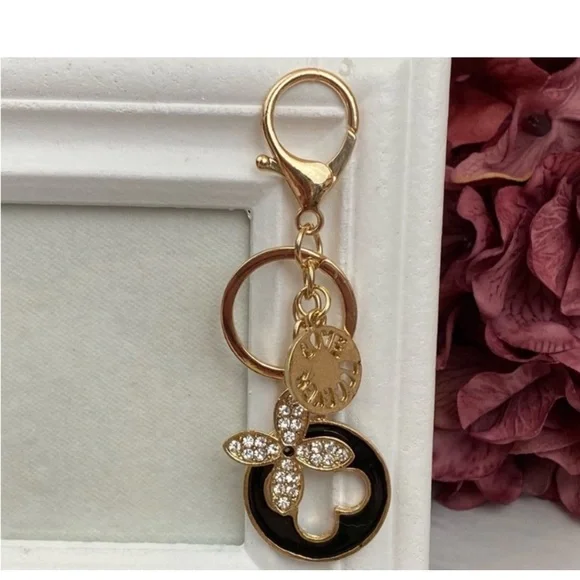 Gold and Black Keychain with Floral Charm - Picture 2 of 3